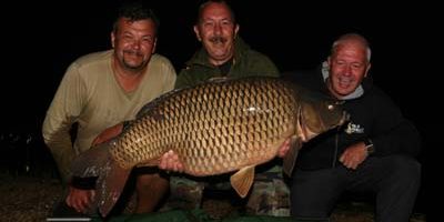 Andrey Stars and Jim with 55lb 14oz.jpg